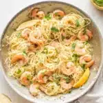A bowl of Easy Shrimp Scampi Pasta with plump shrimp and angel hair noodles ready to serve