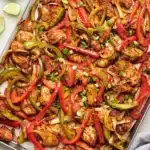 Golden brown Sheet Pan Chicken Fajitas Recipe ready to serve with warm tortillas