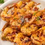 Longhorn Steakhouse Parmesan Crusted Chicken 7 Texas Roadhouse grilled shrimp skewers on a plate