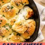 Garlic Cheese Stuffed Rolls with melted cheese, garlic herb butter and parmesan in a cast iron skillet, Recipenly